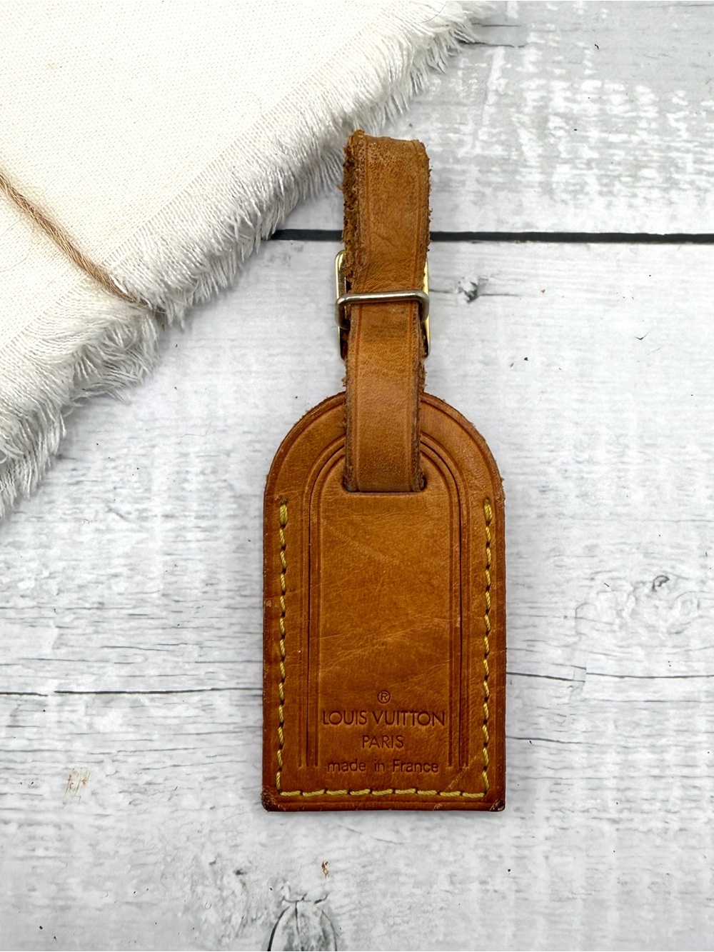 AUTHENTIC Vachetta Leather Luggage tag and loop.
